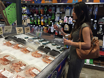 Woman purchasing animal products